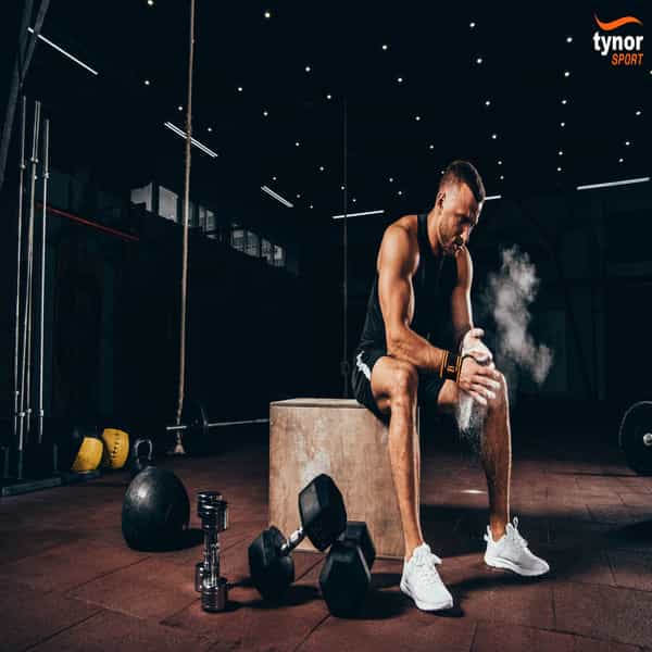 Tynor Wrist Wrap With Thumb Loop Black & Orange Universal Pack Of 2